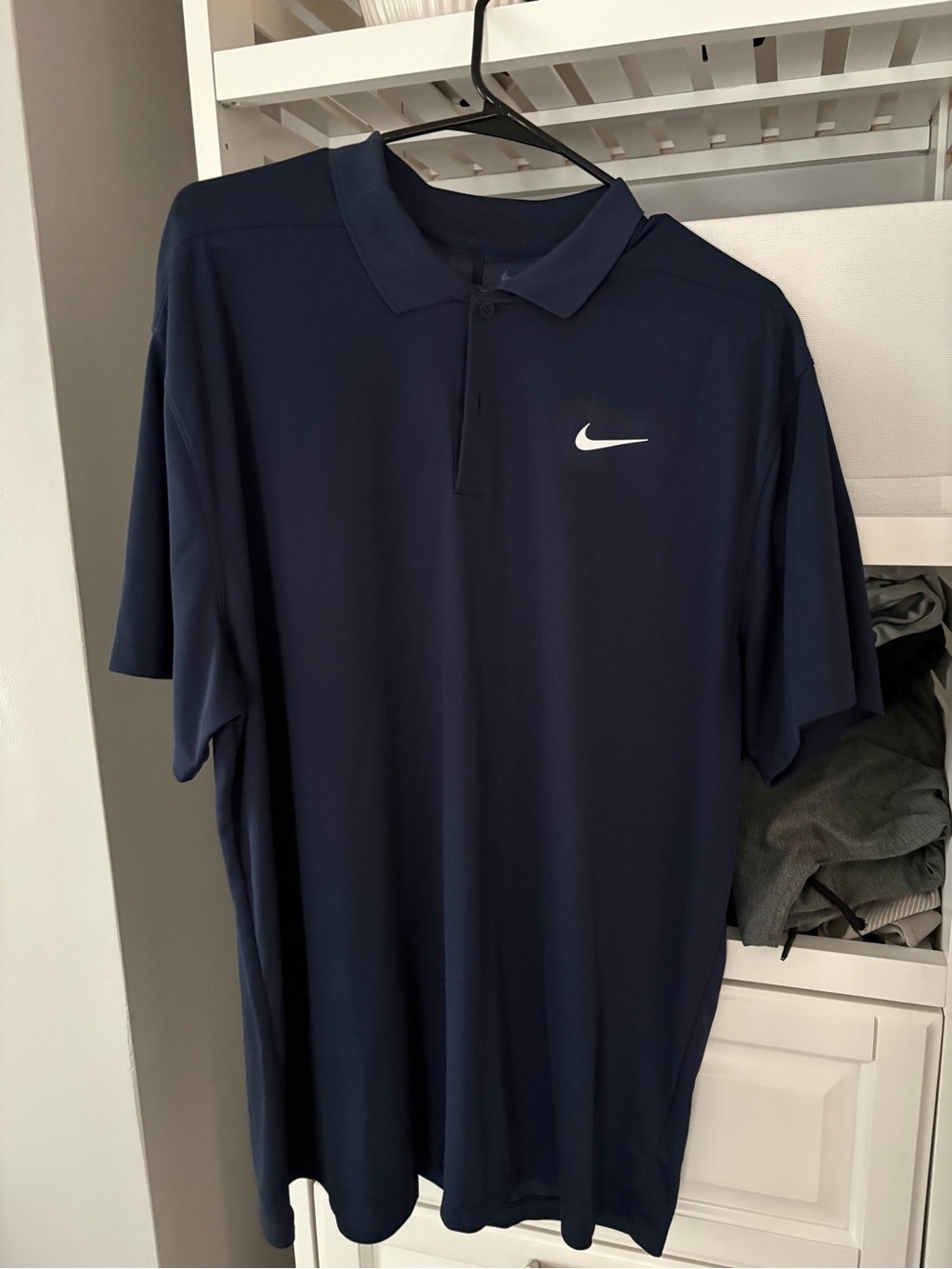 Nike Navy Dri-FIT Polo with White Swoosh